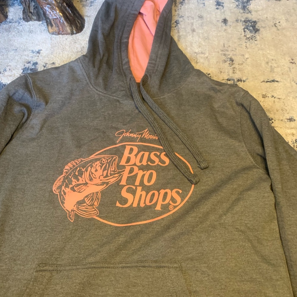 Bass pro shop pink and grey sweatshirt.